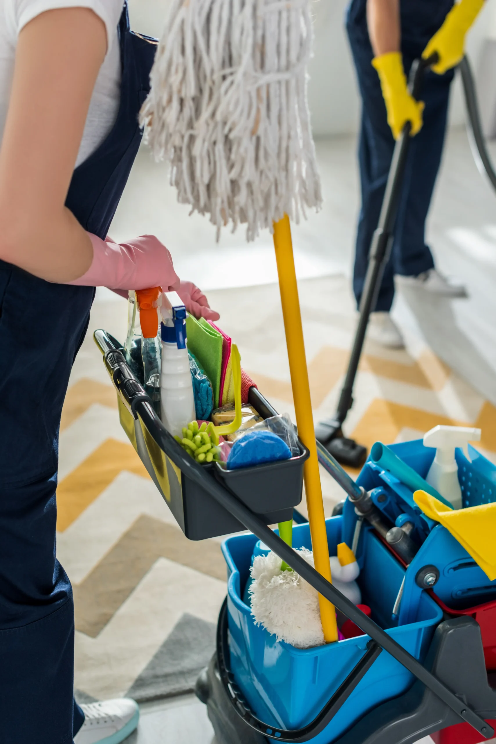 A cleaning crew using an all cleaning supply organizer.